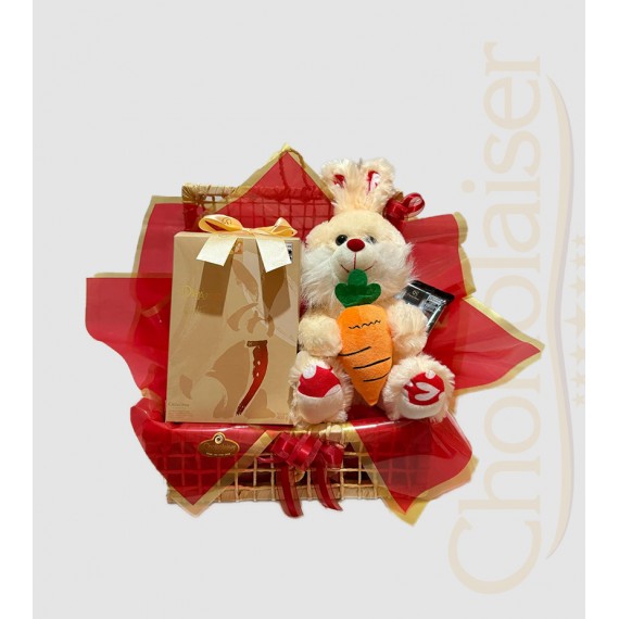 Cesta com coelhinho de pelúcia, chocolate da cacau show, ovo de páscoa e trufas
